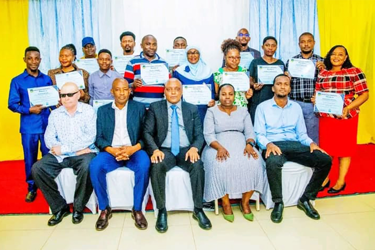 Prof. John Safari Presents Certificates to Financial Education Service Providers